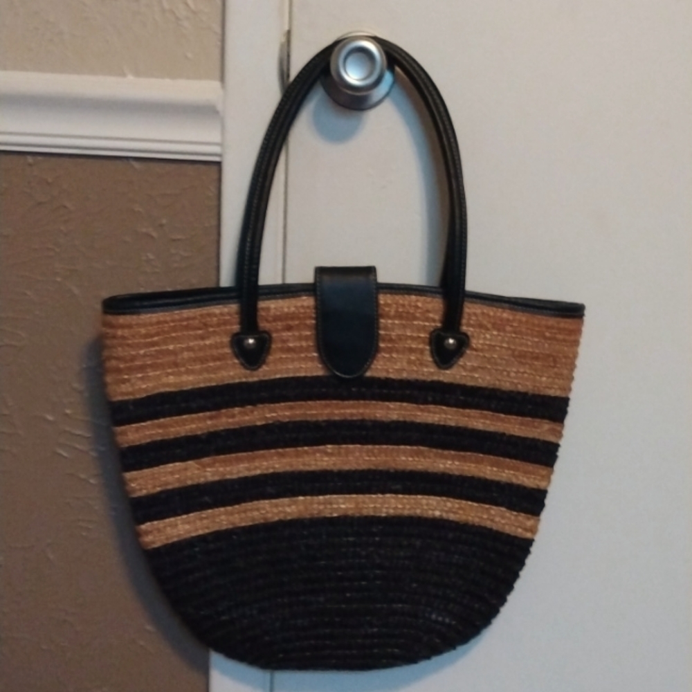 Large tan and black woven wicker purse
